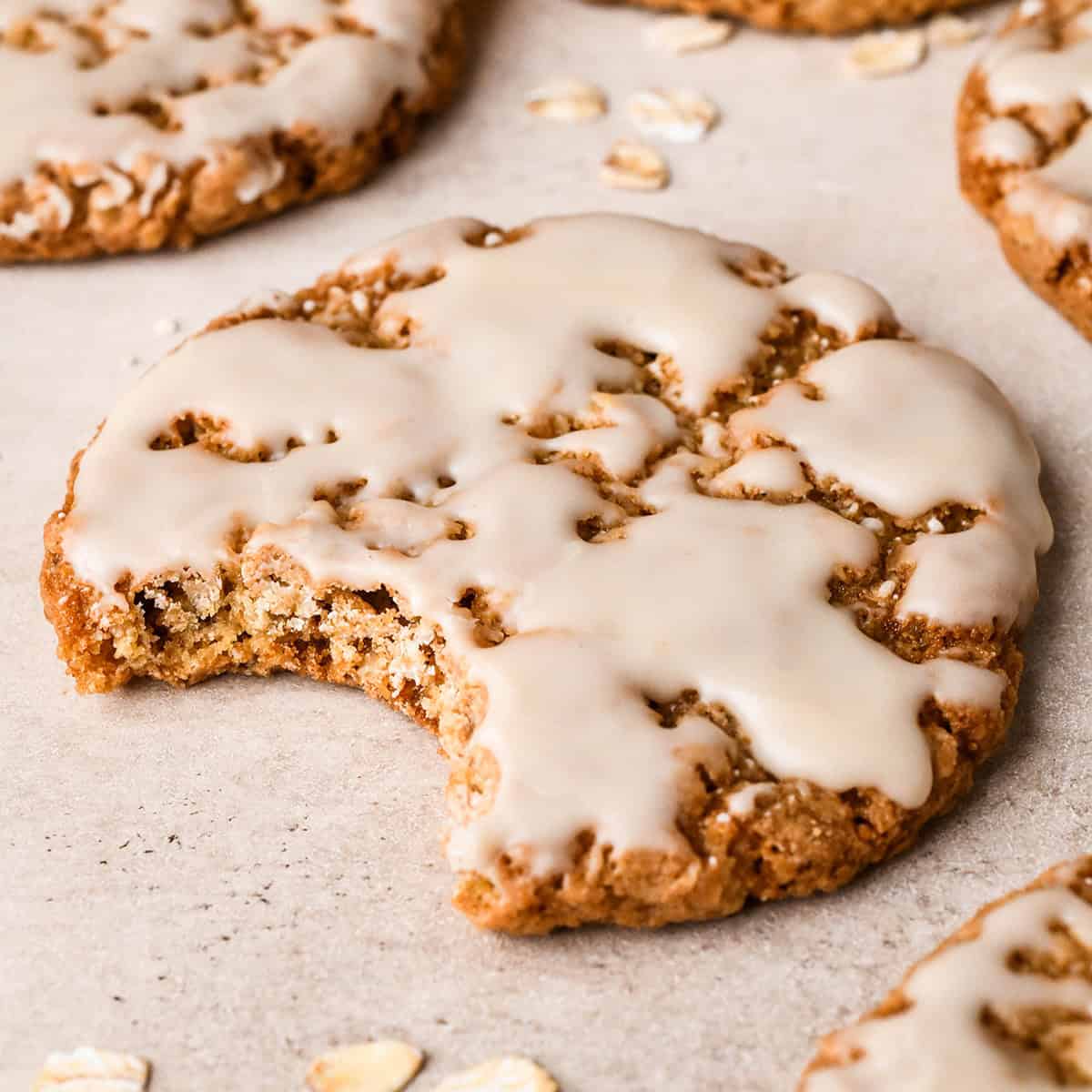 an Iced Oatmeal Cookie with a bite taken out of it