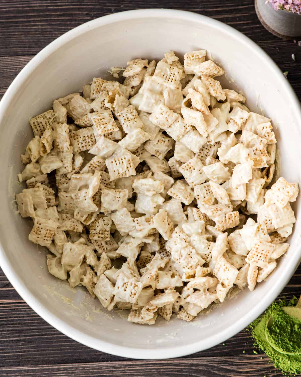 how to make Matcha Puppy Chow Recipe - white chocolate stirred into cereal