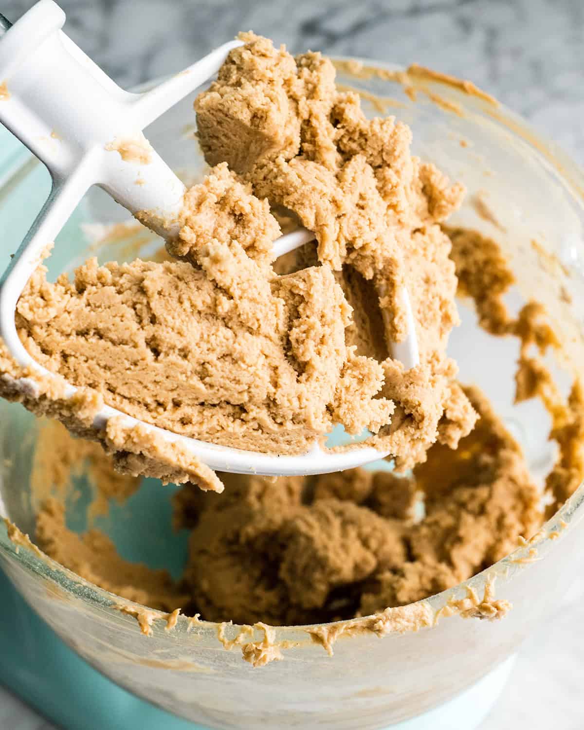 making Peanut Butter Blossoms recipe in a standing mixer - dough in a standing mixer after beating