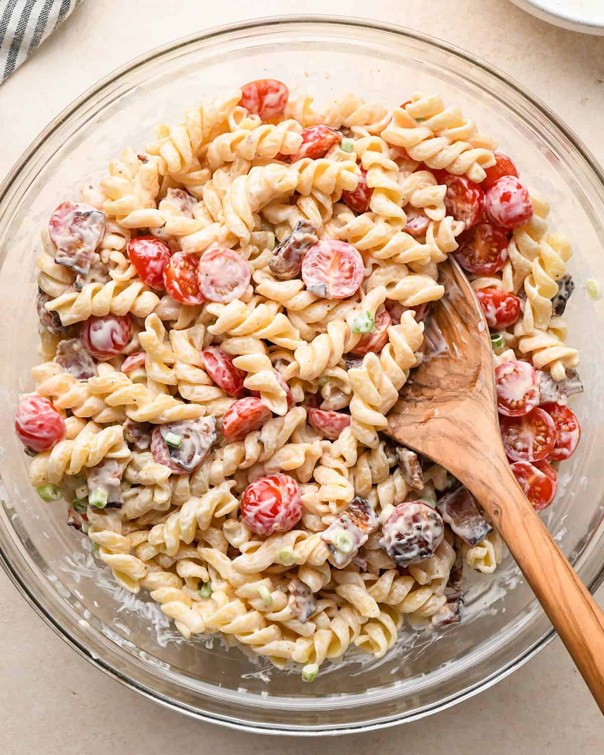 how to make BLT Pasta Salad Recipe - dressing stirred into the salad