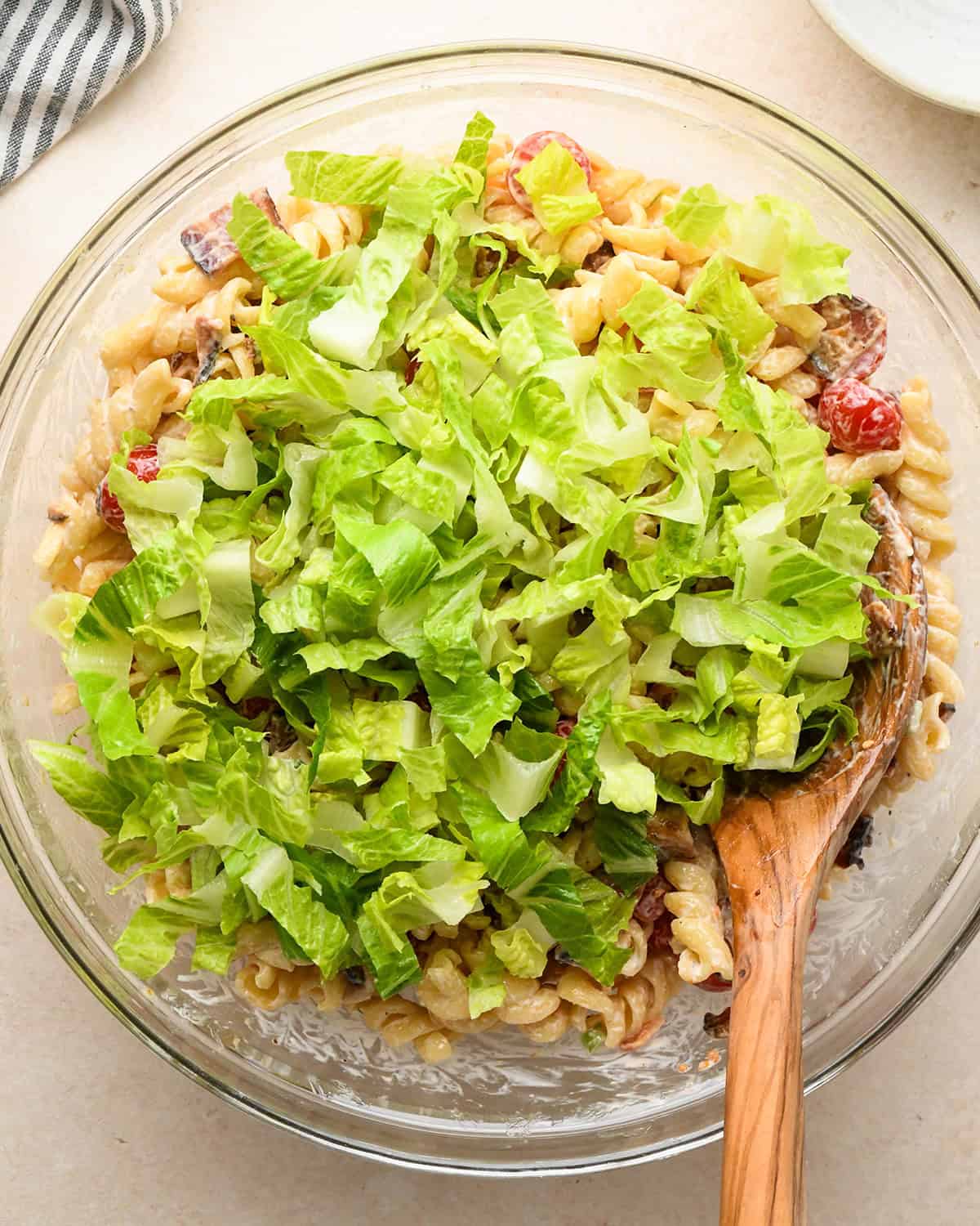 how to make BLT Pasta Salad Recipe - lettuce added before stirring