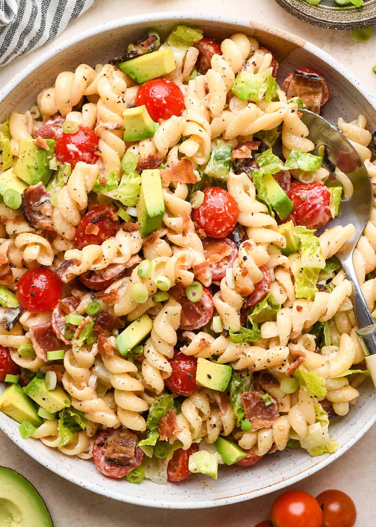 BLT Pasta Salad in a bowl with a spoon