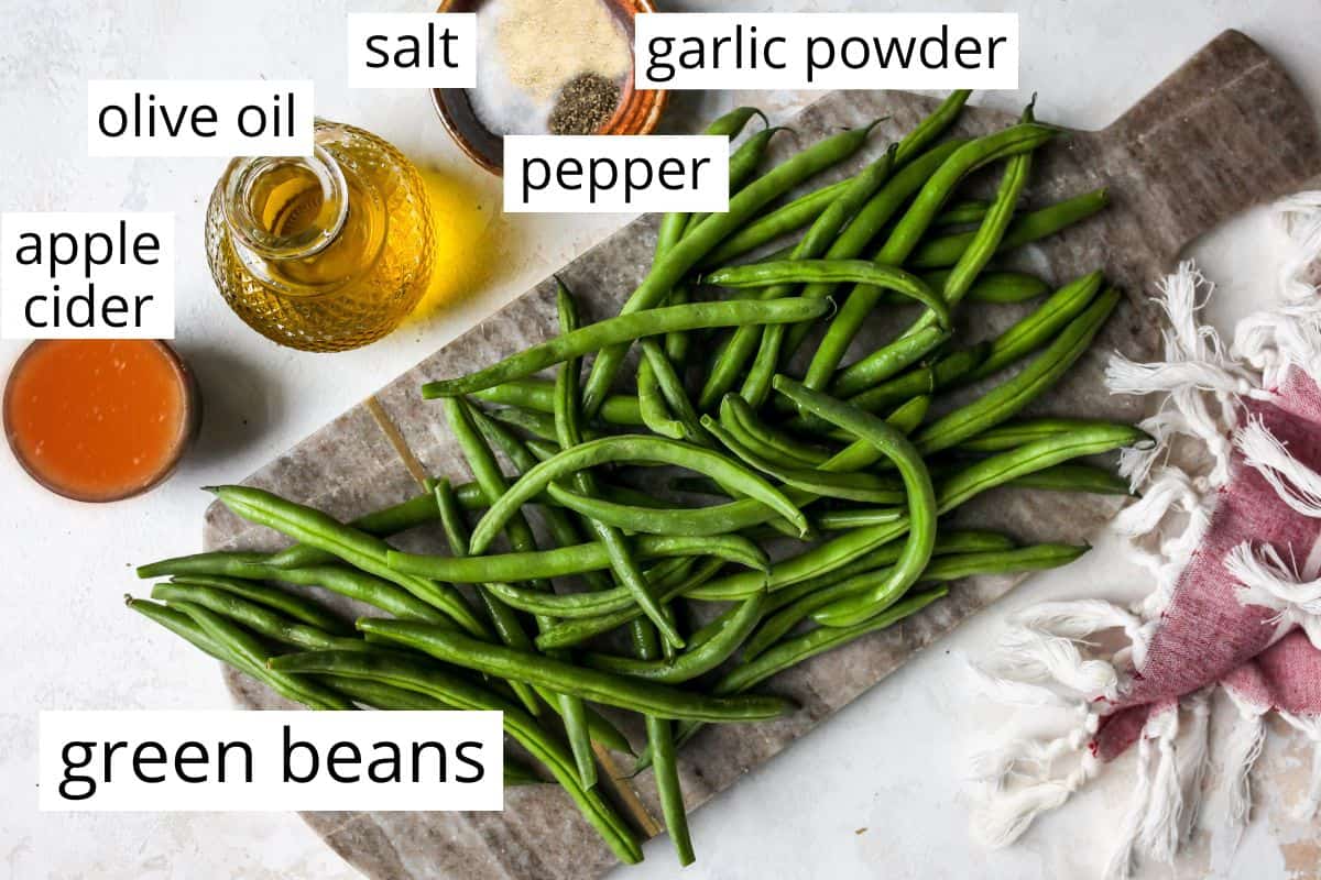 overhead photo of the labeled ingredients in this Sautéed Green Beans recipe
