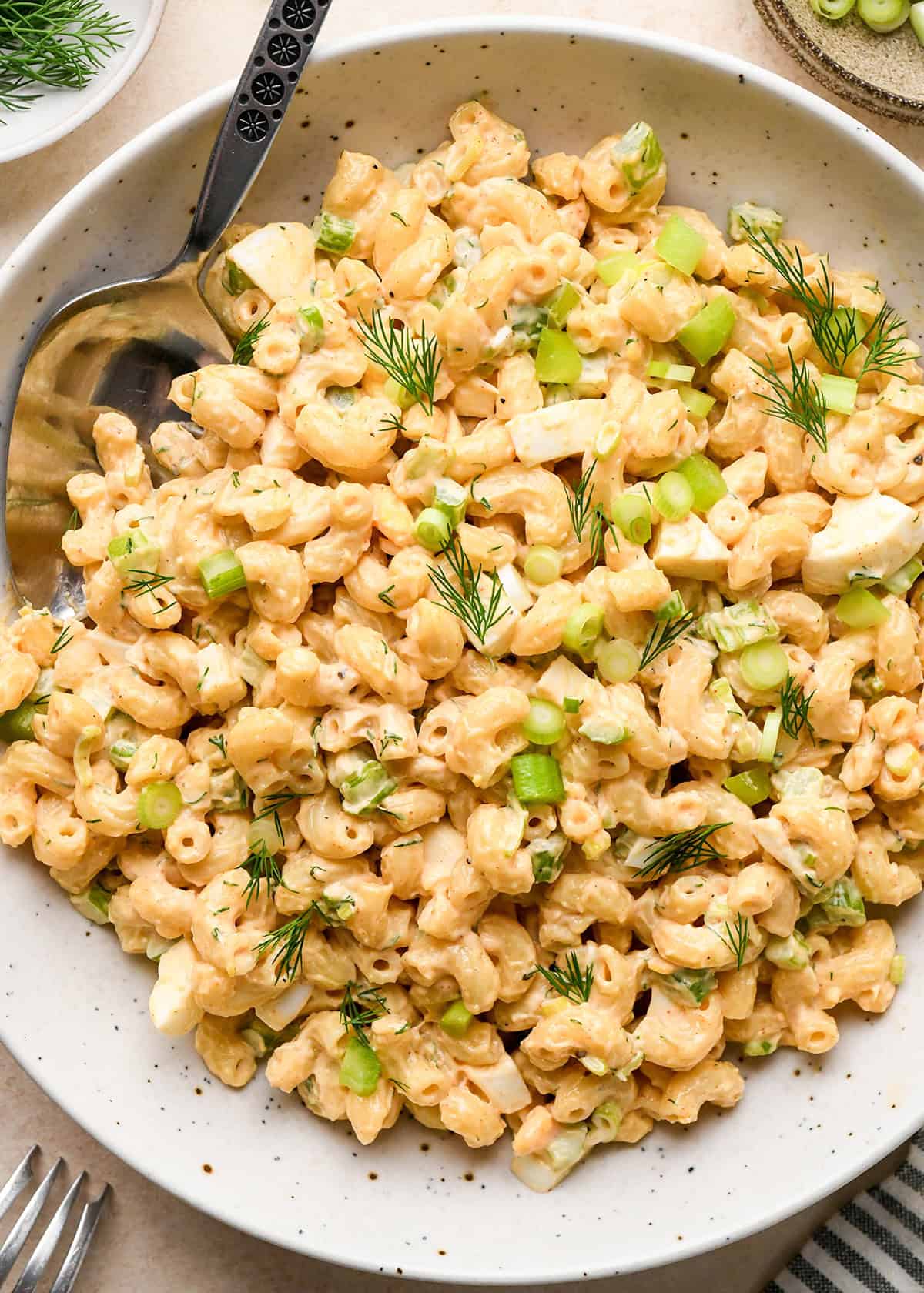 Macaroni Salad in a bowl with a spoon