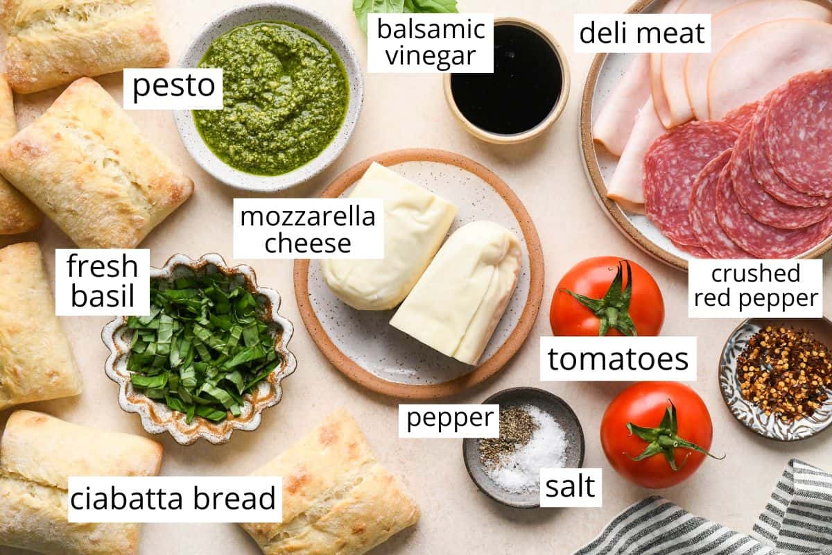 overhead photo of the labeled ingredients in this Caprese Sandwich Recipe