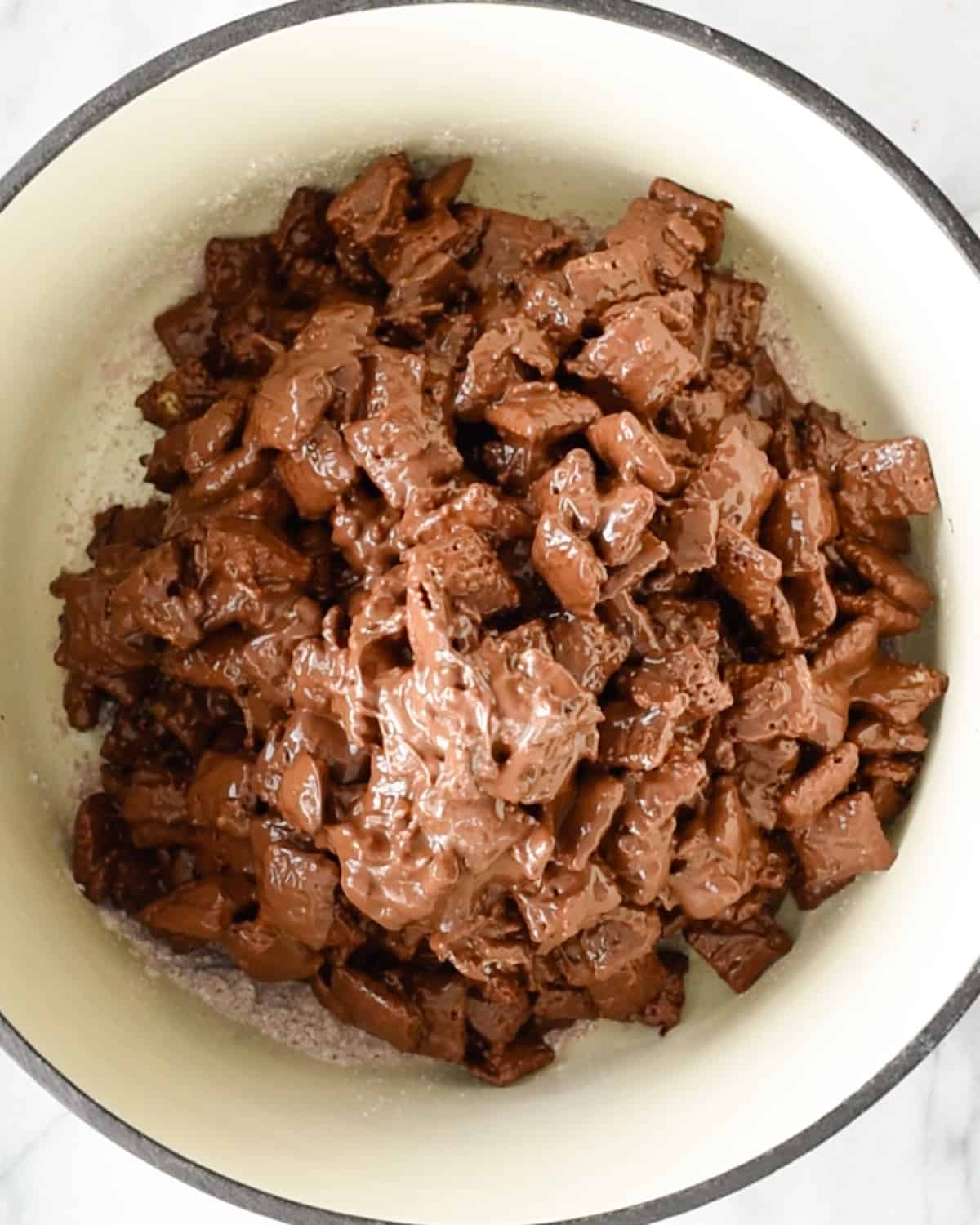 how to make dark chocolate puppy chow - mixture after chilling slightly in a bowl