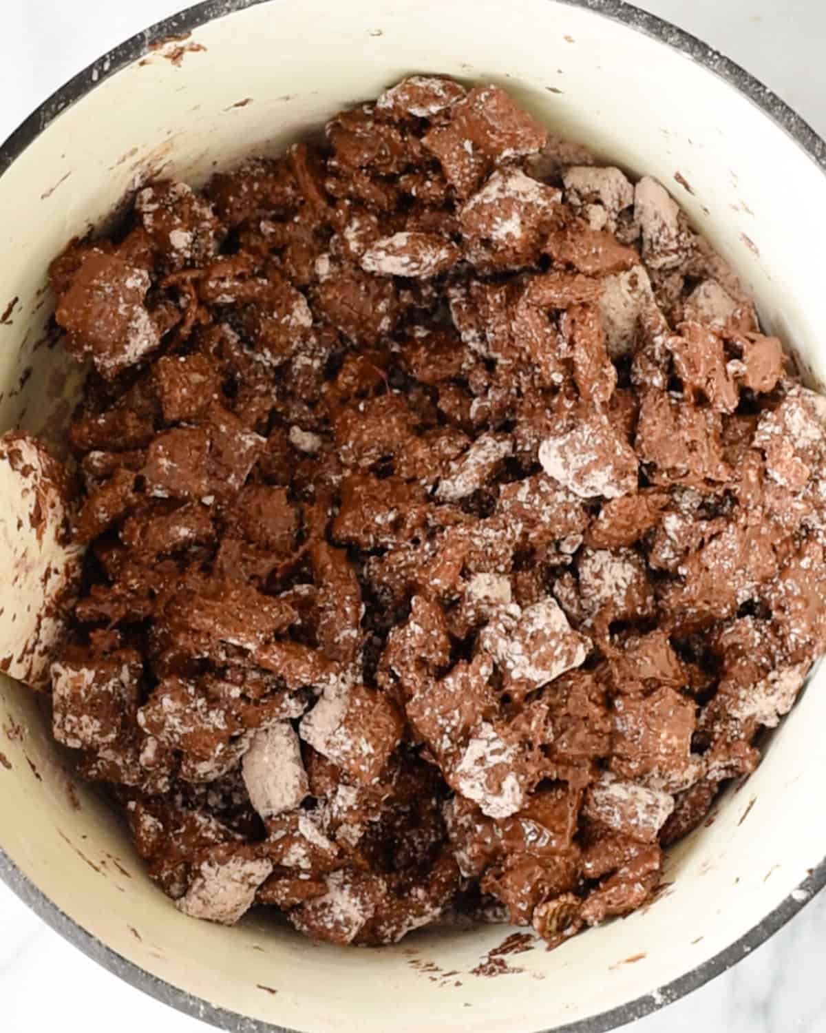 how to make dark chocolate puppy chow - after stirring in powdered sugar mixture