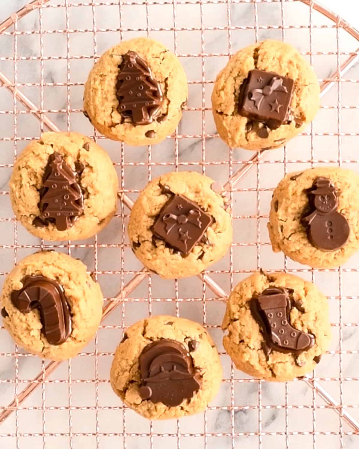 Gluten Free Peanut Butter Blossoms on a wire cooling rack
