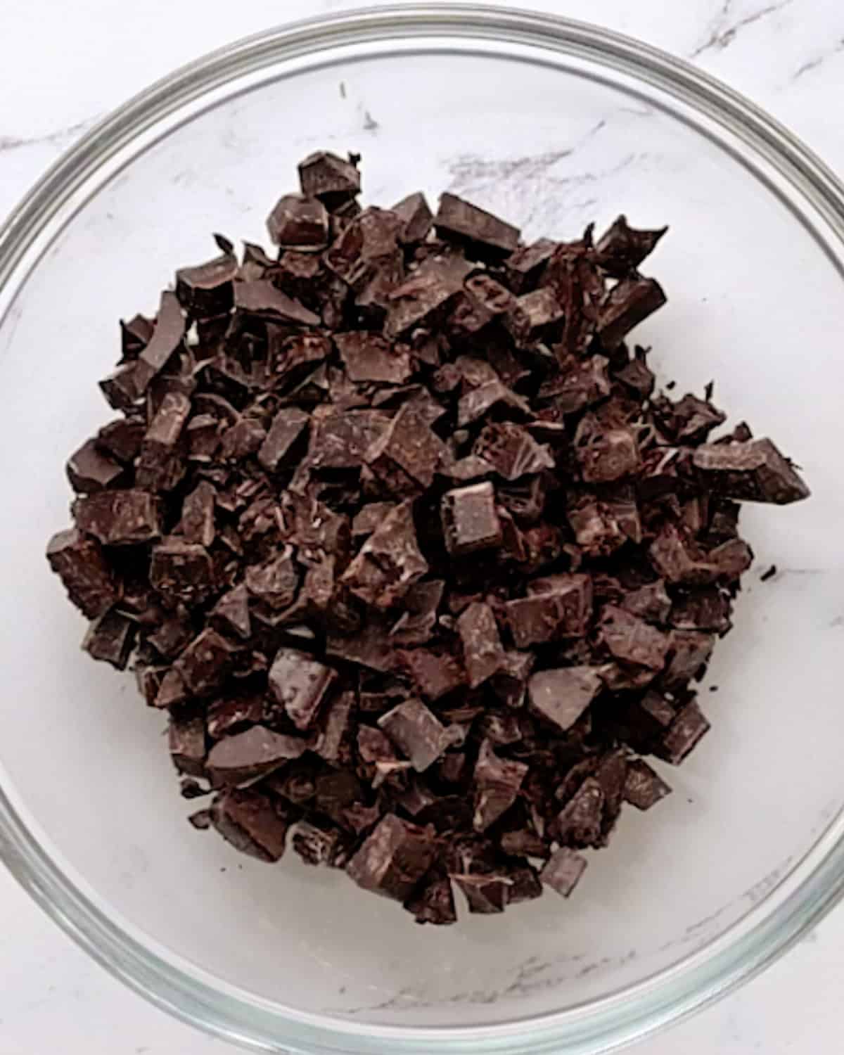 How to Make Chocolate Covered Cashews - chocolate in a bowl before melting