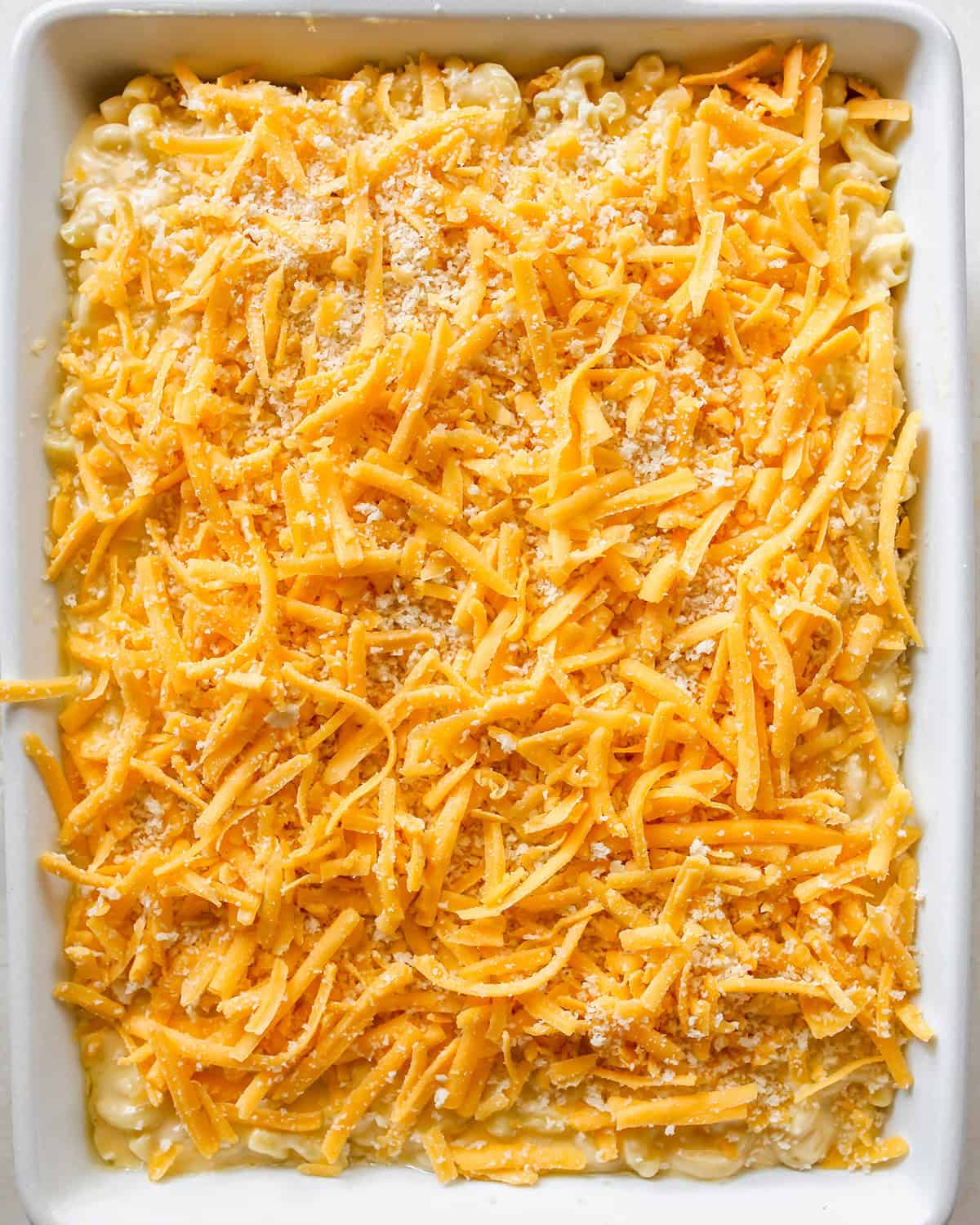 Greek Yogurt Mac & Cheese in a baking dish with the topping before baking