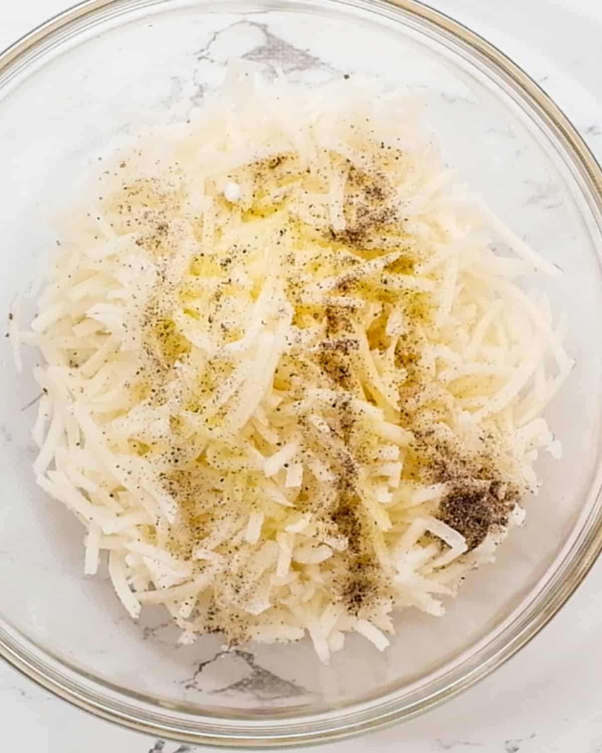 Hash Brown Crust ingredients in a bowl before mixing