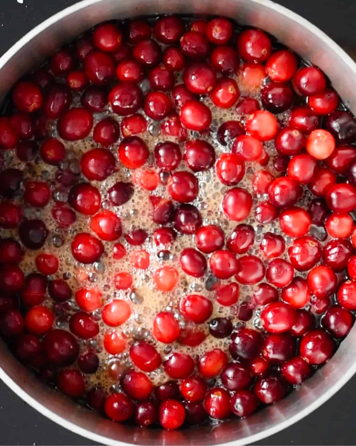 How to Make Healthy Cranberry Sauce - adding cranberries