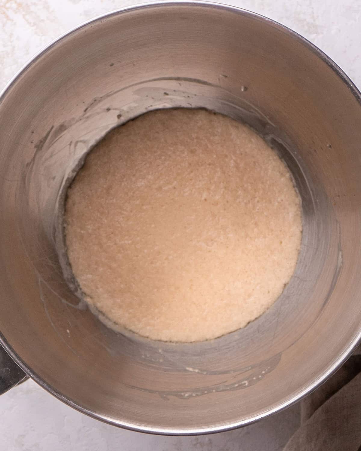 How to Make Honey Wheat Bread - proofed yeast in a bowl