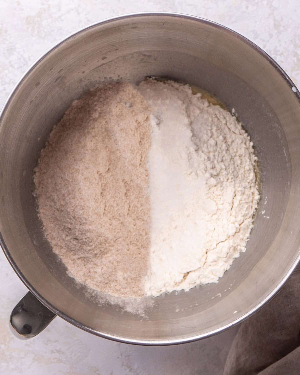 How to Make Honey Wheat Bread - adding ingredients to proofed yeast