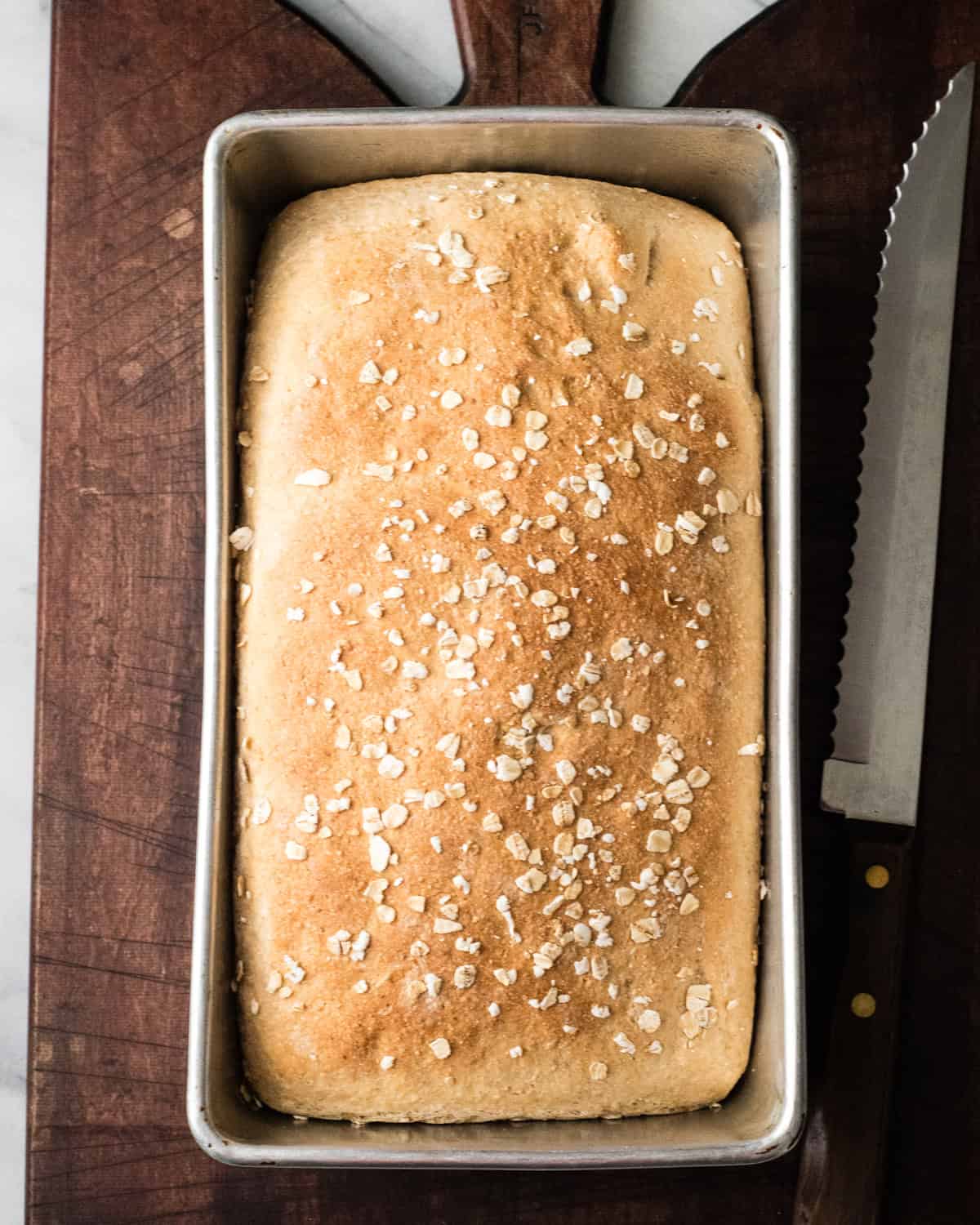 Honey Wheat Bread in a loaf pan after baking