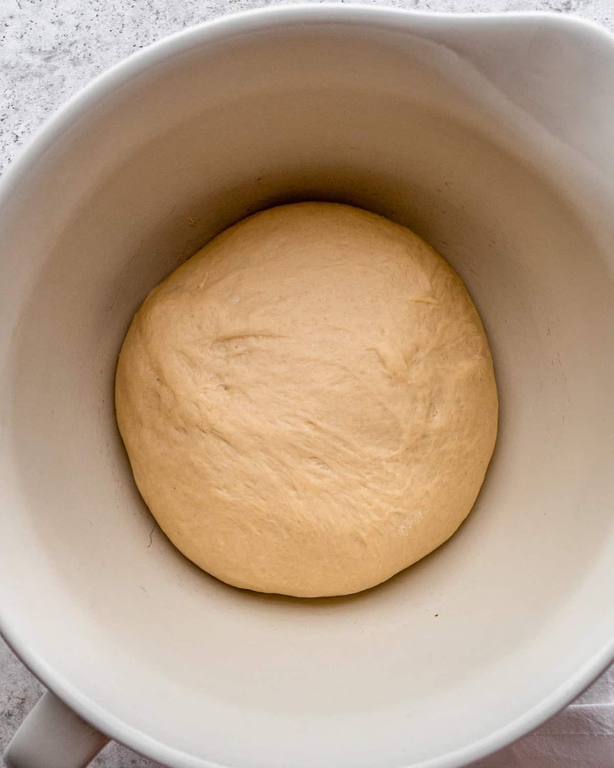 How to Make Pretzel Bread - dough in a bowl before rising
