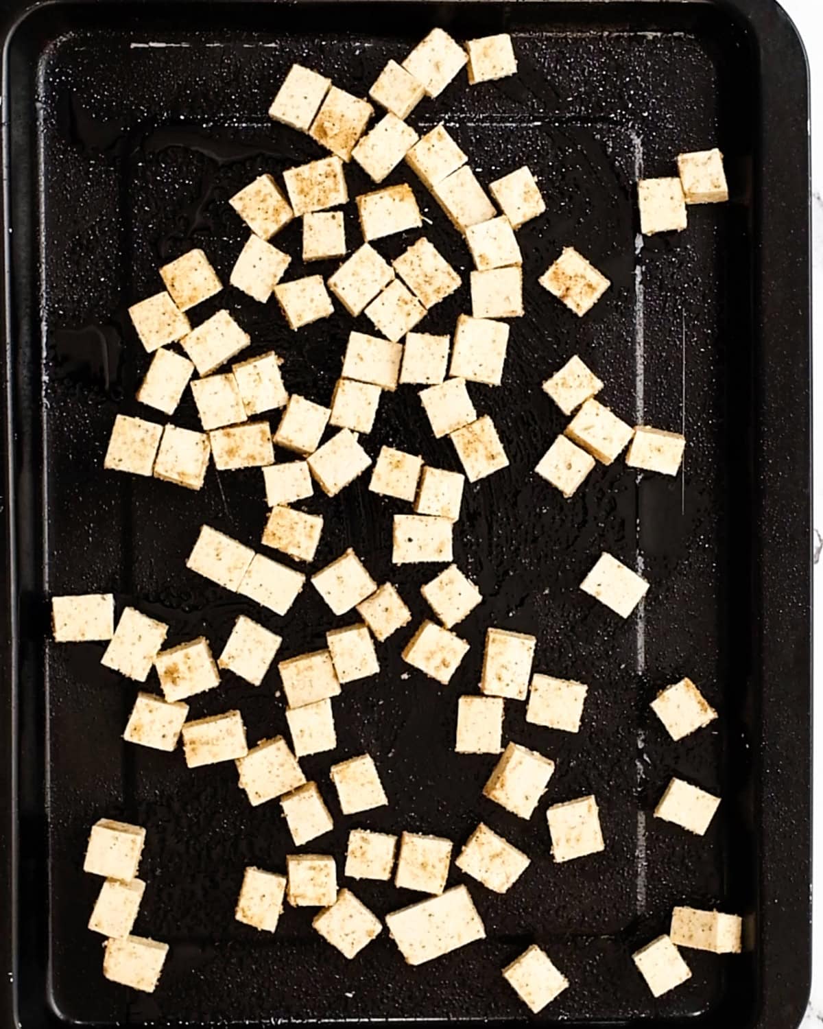 How to Make Baked Crispy Tofu - tofu on baking pan before baking