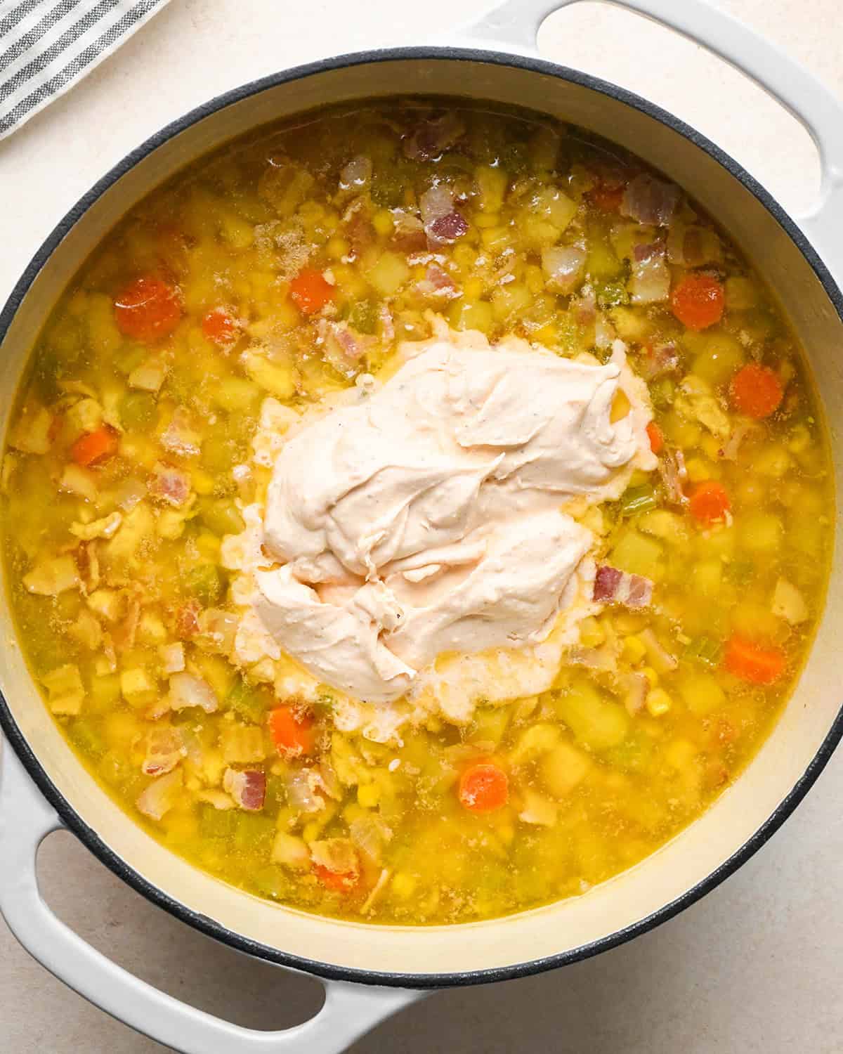 how to make Sweet Corn & Chicken Soup - adding sauce mixture and thickener to soup