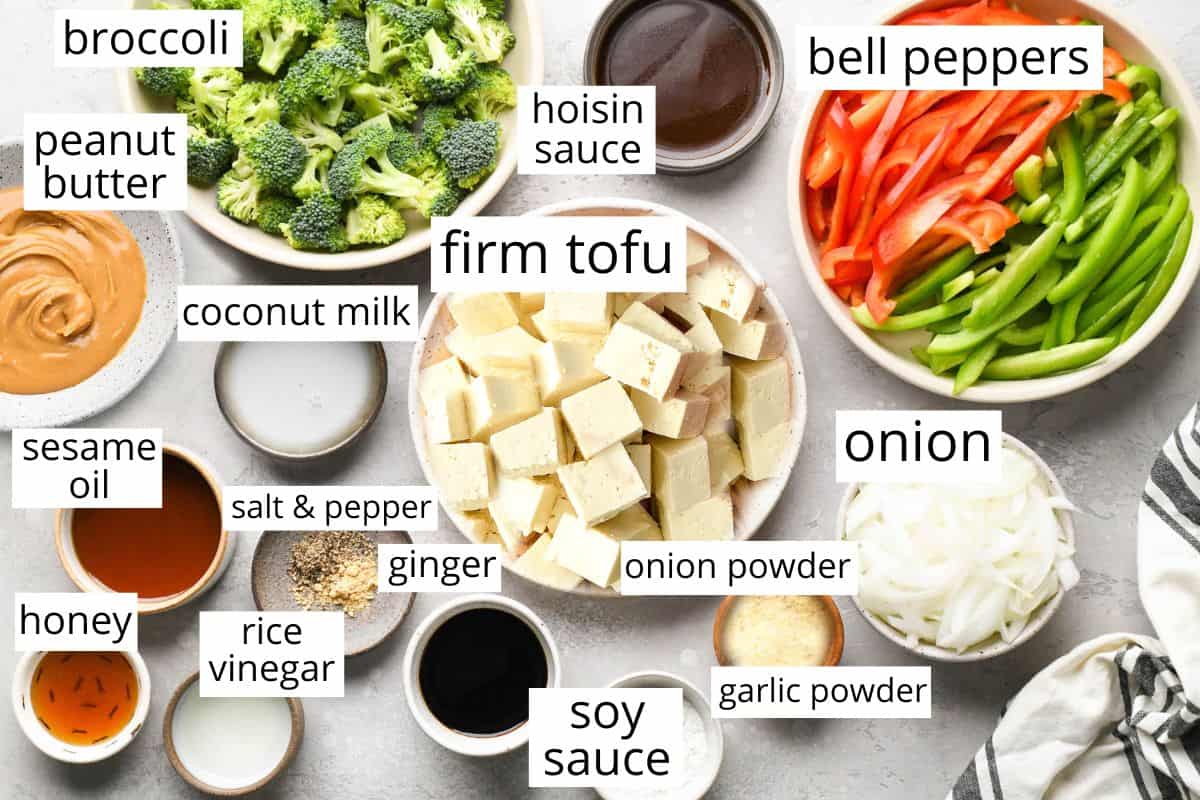overhead photo of the labeled ingredients in this Baked Crispy Tofu & Peanut Sauce Stir Fry recipe