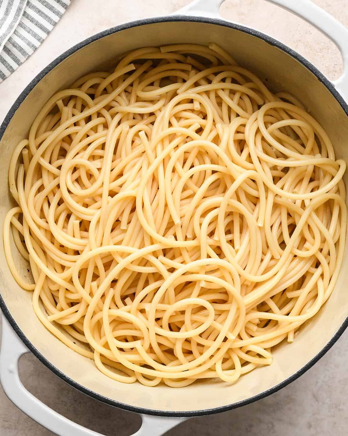 how to make Cacio e Pepe Pasta - adding pasta to sauce in pot