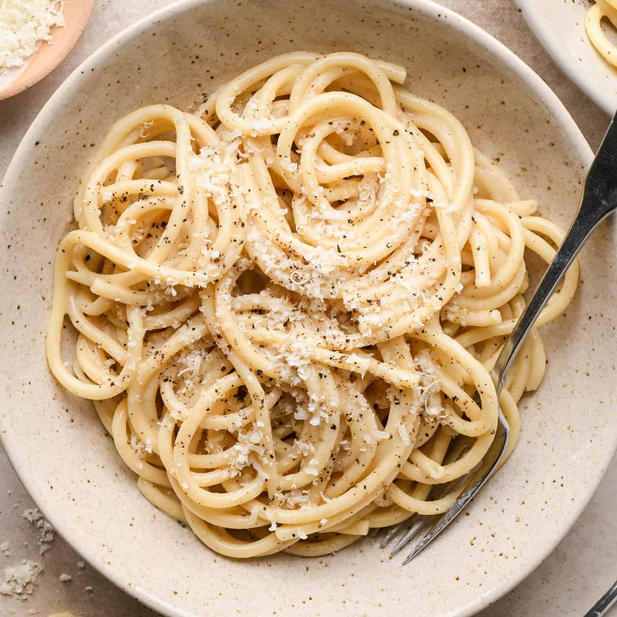 Cacio e Pepe Pasta in a bowl with a fork
