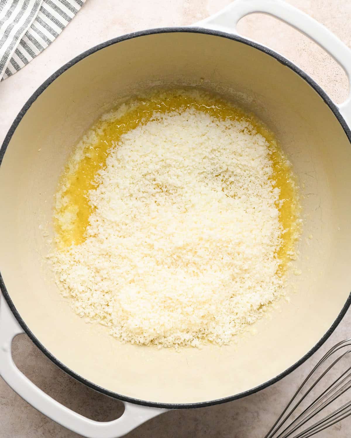 how to make Cacio e Pepe Pasta sauce - cheeses added before whisking