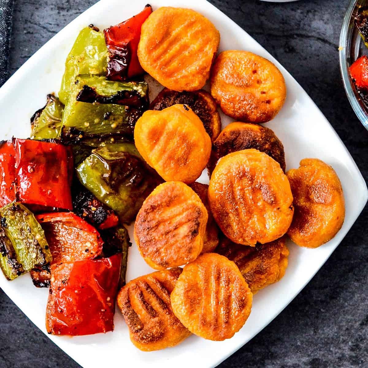 Paleo Sweet Potato Gnocchi on a plate with vegetables