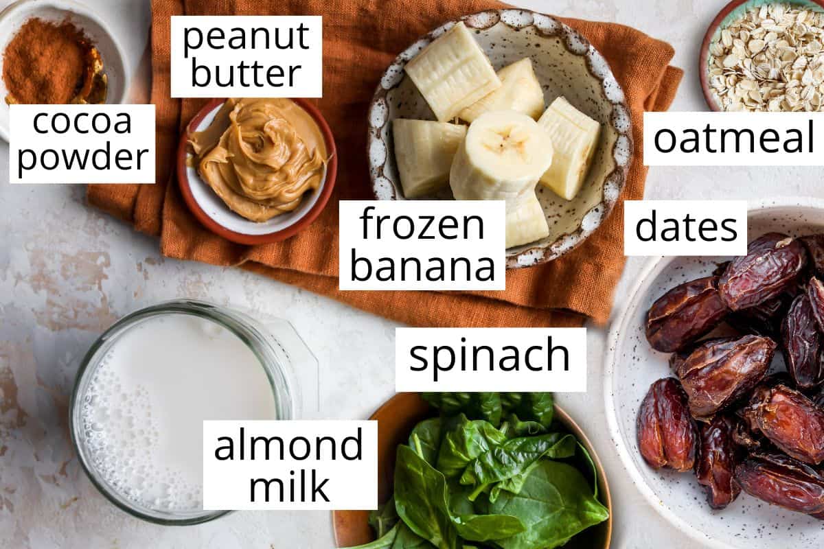 overhead photo of the labeled ingredients in this Banana Oatmeal Peanut Butter Smoothie