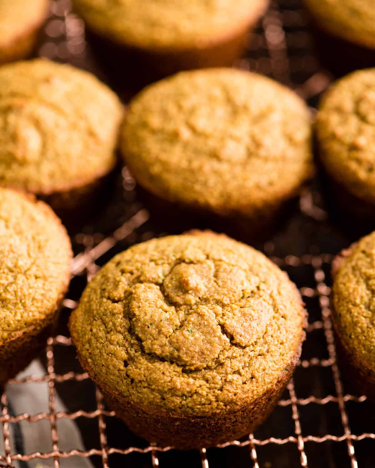 9 Carrot Zucchini Muffins  on a wire cooling rack