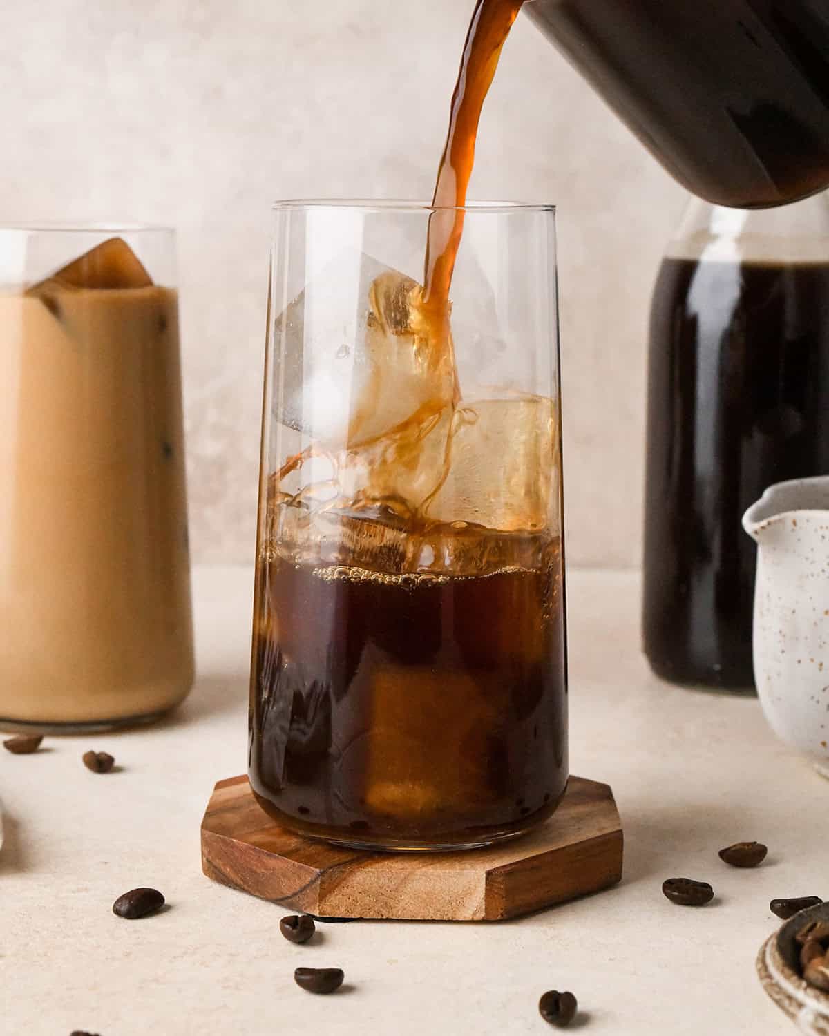 Cold Brew Coffee being poured into a glass with ice