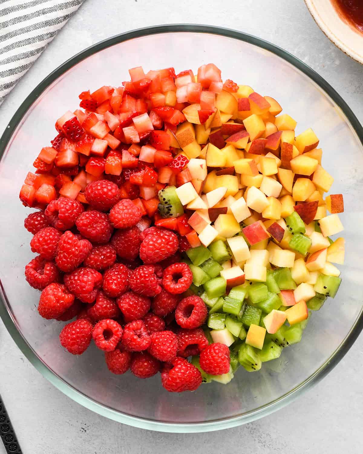 making Fruit Salsa Recipe - fruit in a bowl before mixing