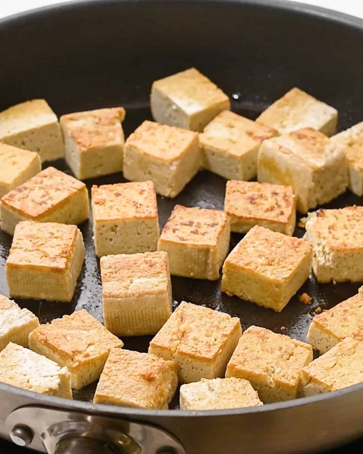 golden-brown tofu after cooking in oil. 