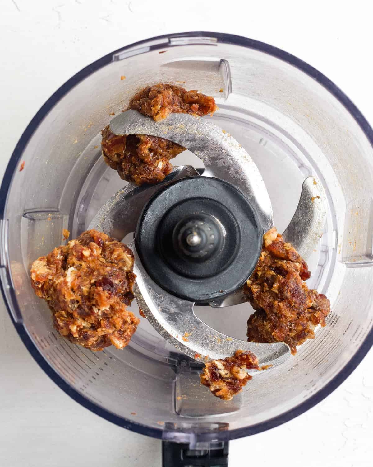 making Coconut Date Balls - dates in a food processor after processing
