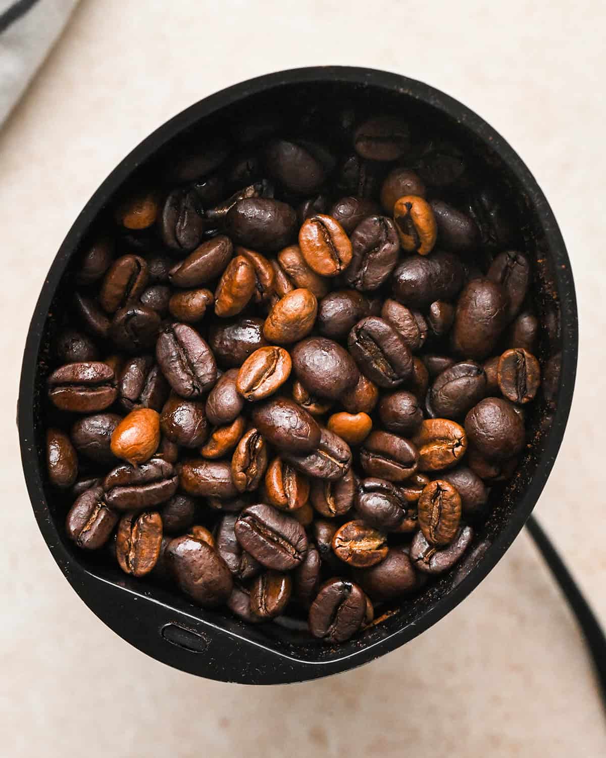 coffee beans in a grinder before grinding