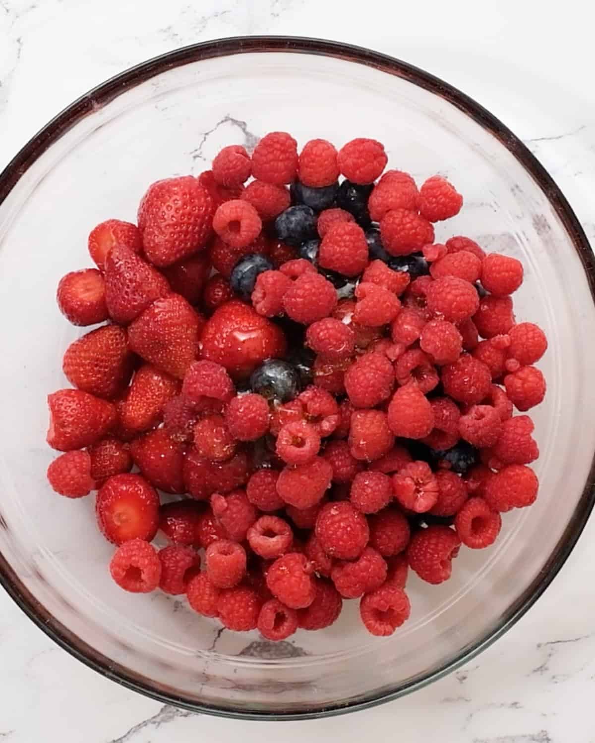 How to Make Healthy Berry Crisp -  berries &  in a bowl before mixing