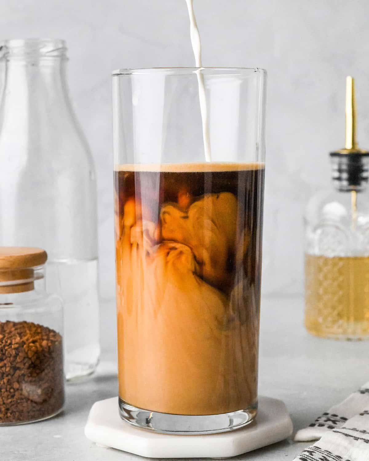 How to Make Iced Coffee adding cream