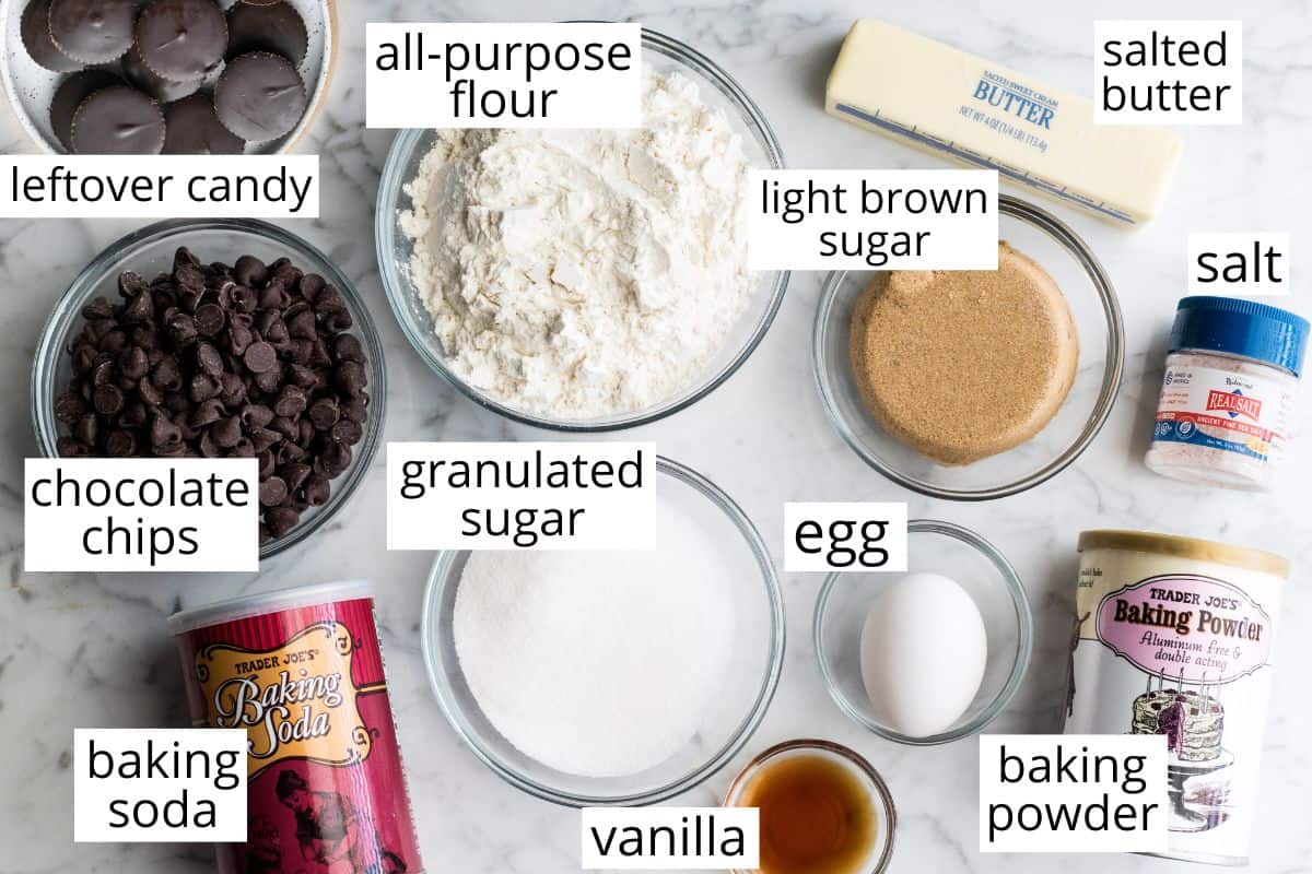overhead photo of the labeled ingredients in this Halloween Candy Cookie Bars recipe