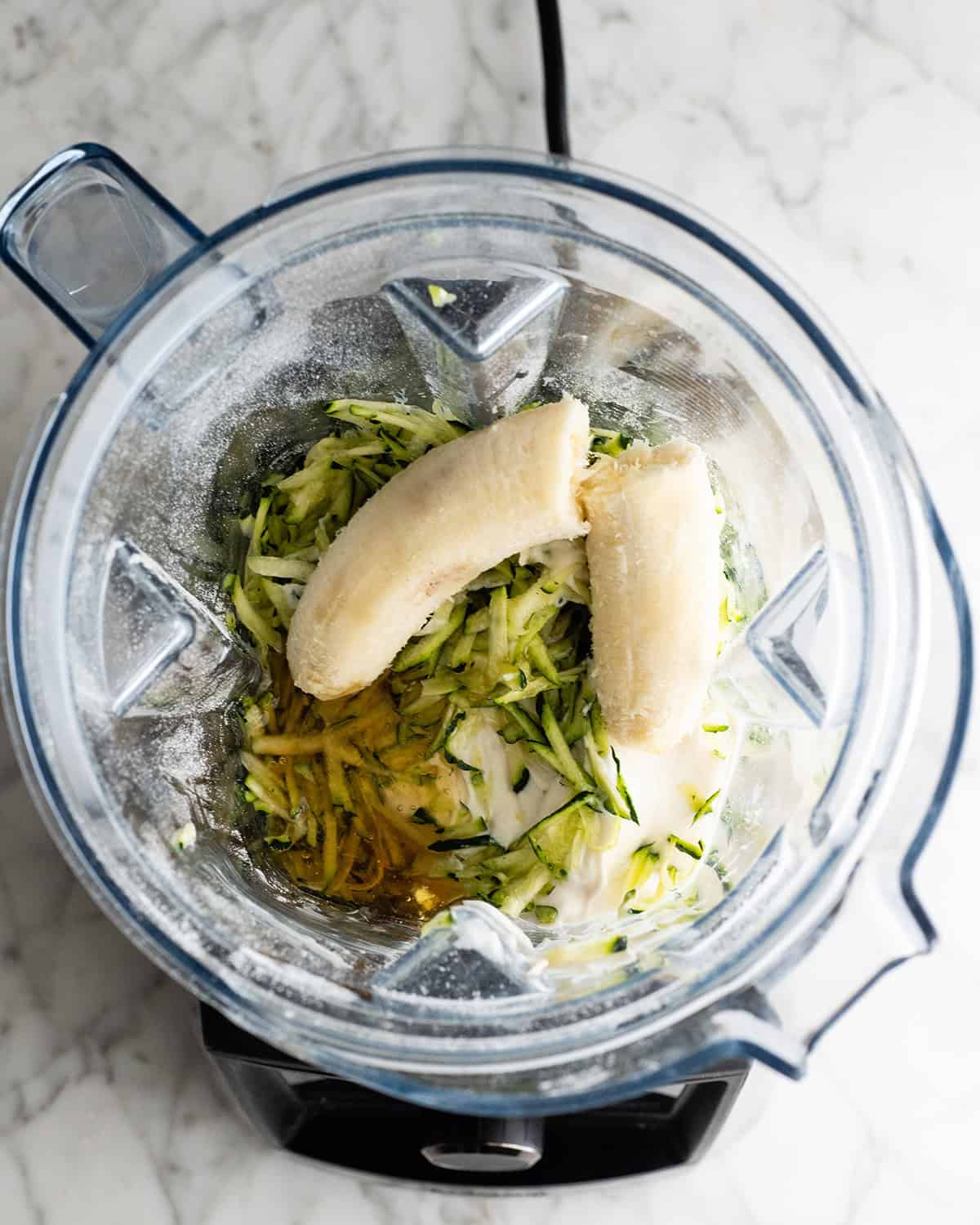 How to Make Paleo Chocolate Zucchini Bread  - zucchini and banana in a blender before blending