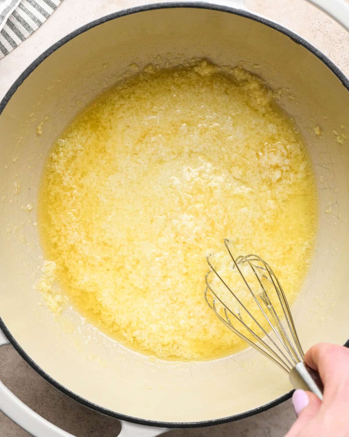 How to Make Parmesan Pasta - adding pasta water after whisking