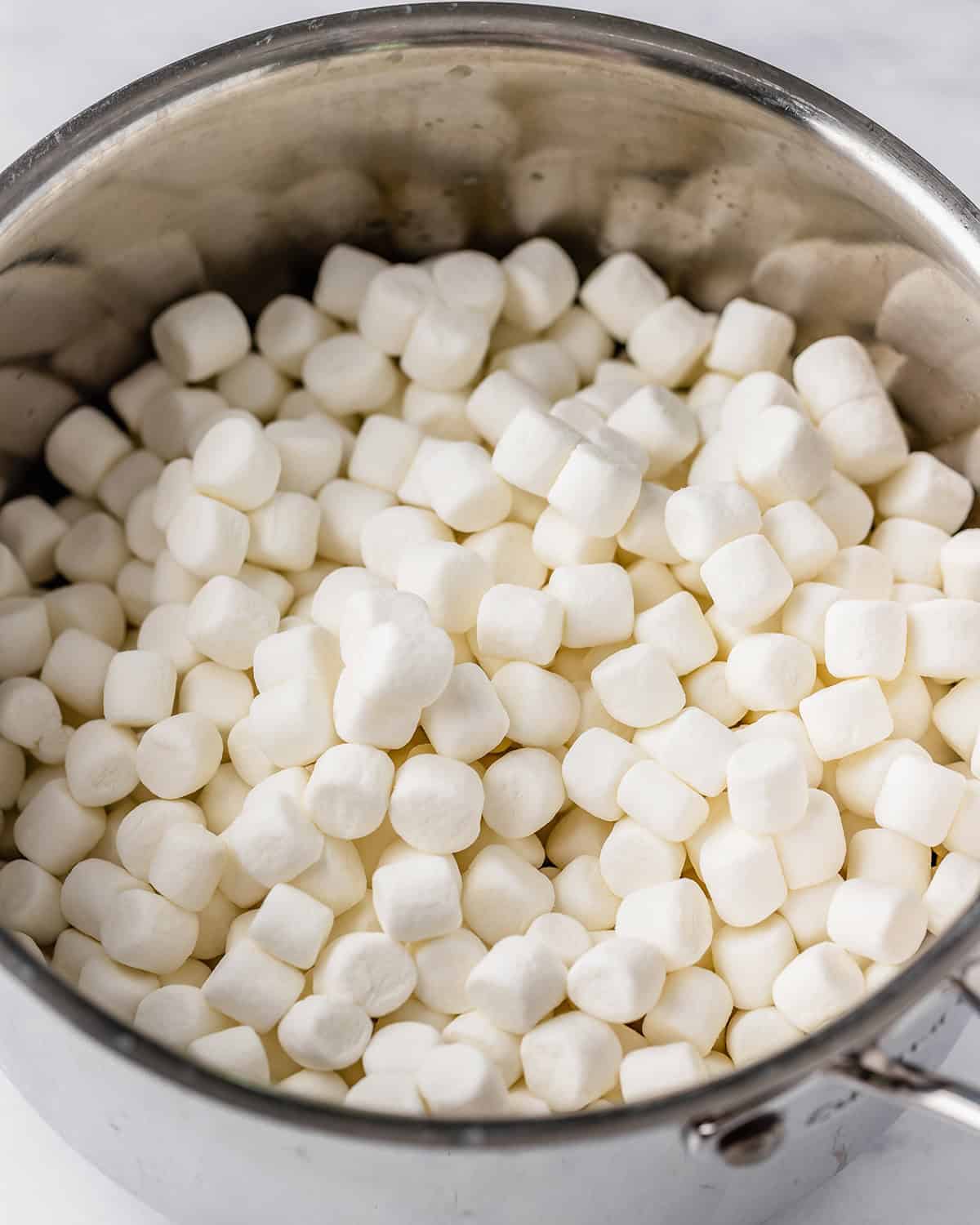 how to make Rice Crispy Dessert Sushi - marshmallows and butter in a saucepan before melting