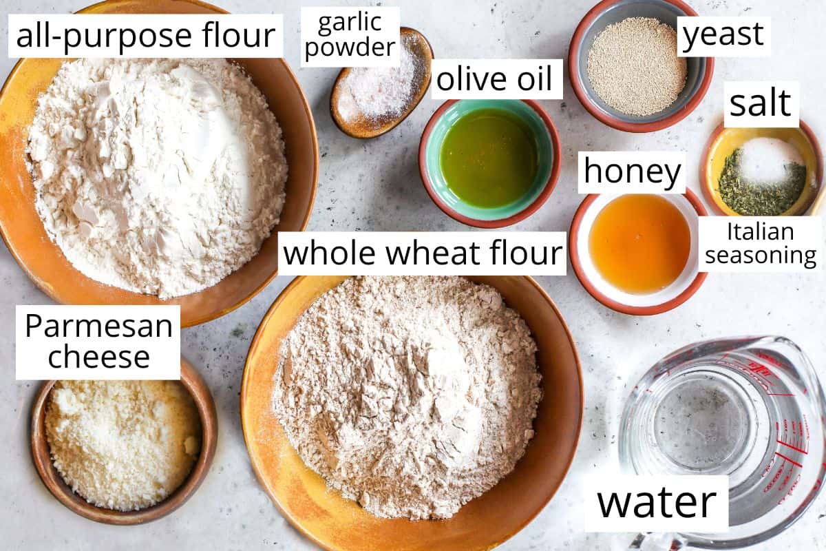 overhead photo of the labeled ingredients in this Whole Wheat Focaccia bread recipe
