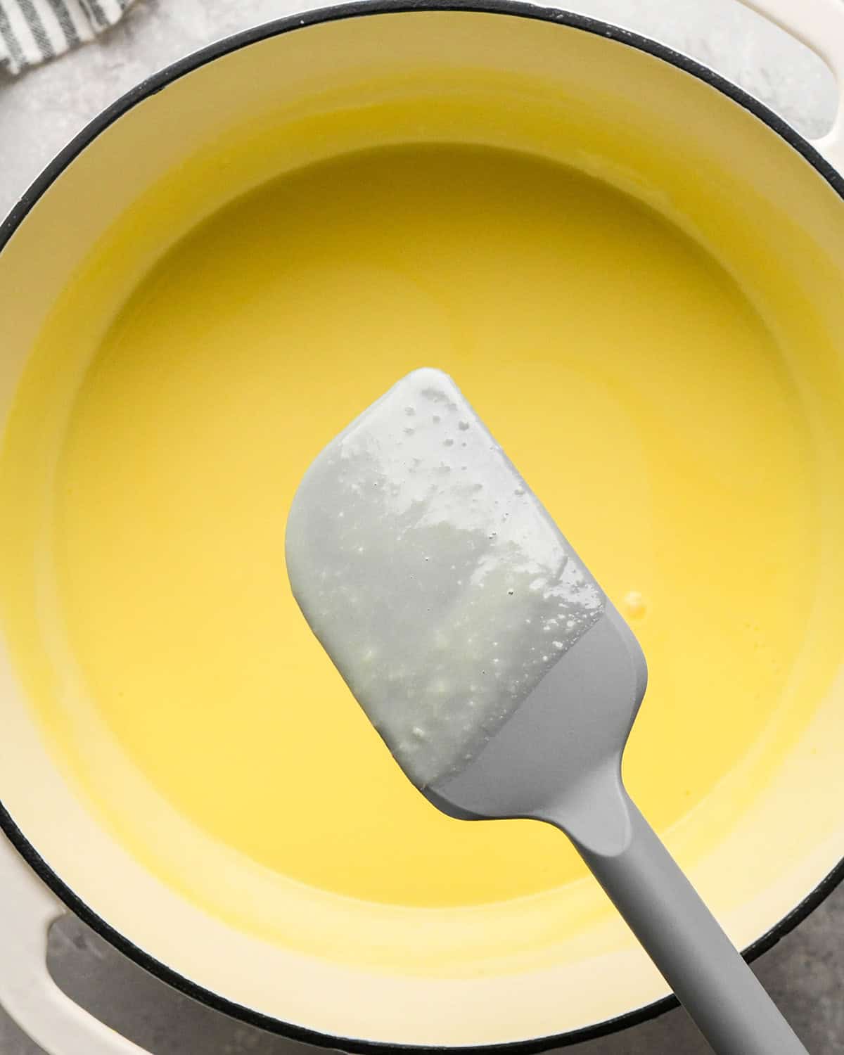 making Mint Chocolate Chip Ice Cream - mixture coating the back of a spatula