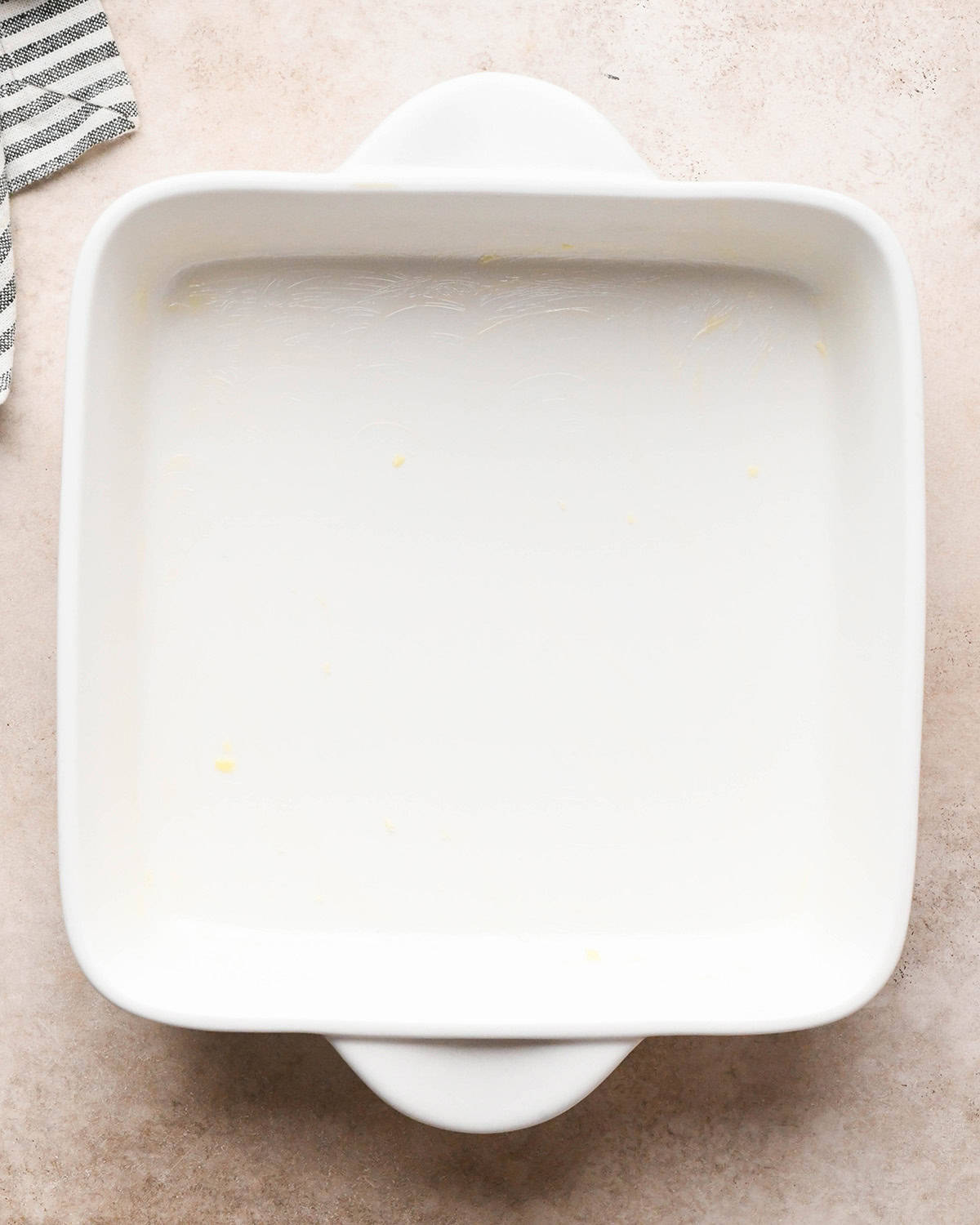 greased, white 9" square baking dish