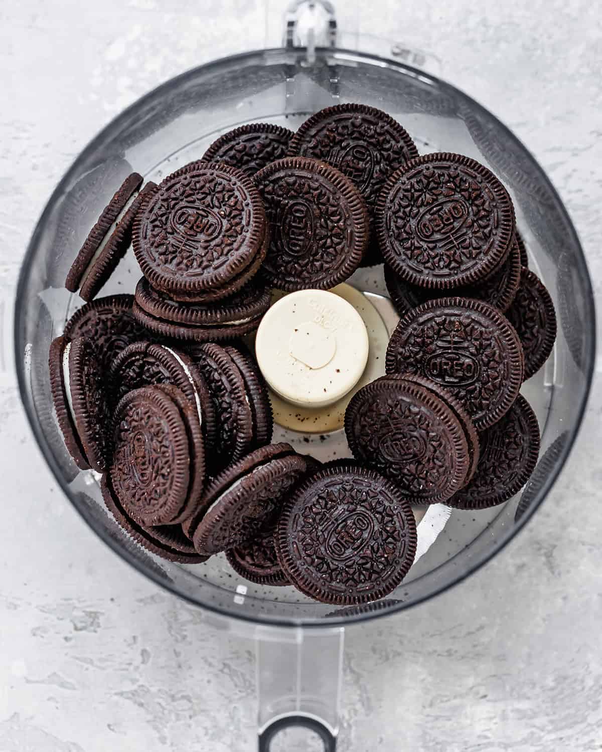 Oreo cookies in a food processor before processing