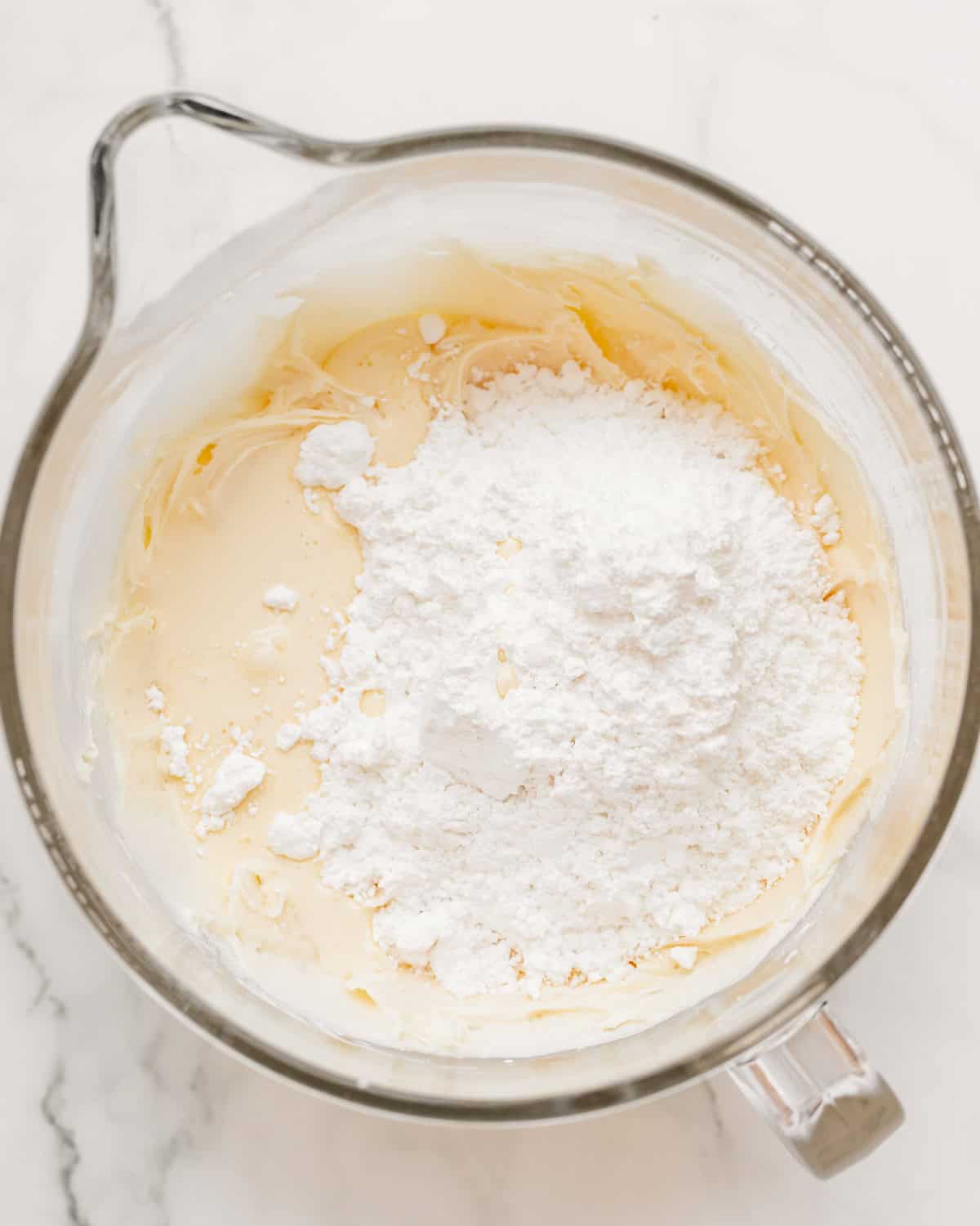 How to Make flag cake frosting - adding milk and more powdered sugar