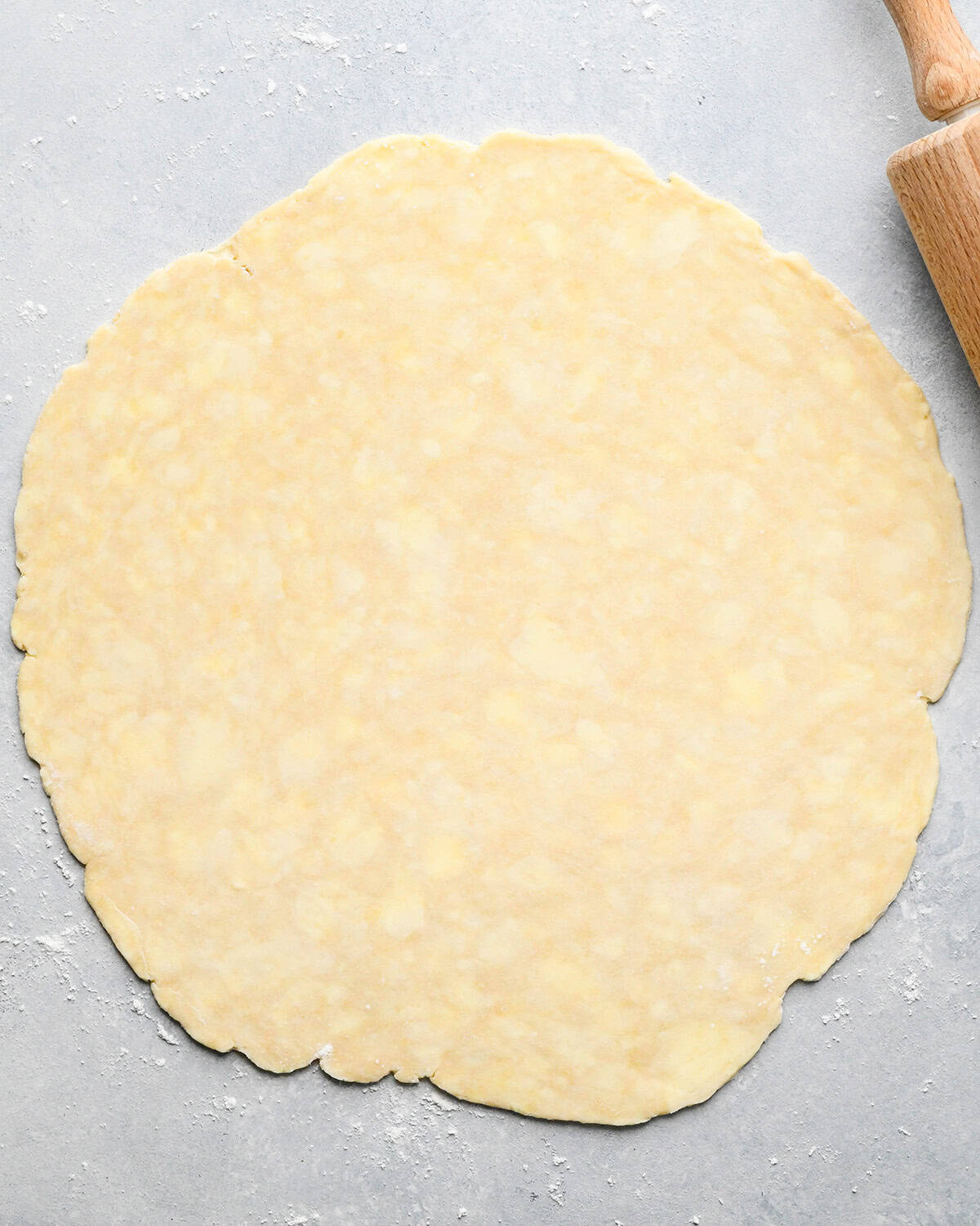 How to Make a Lattice Pie Crust - top crust dough rolled out