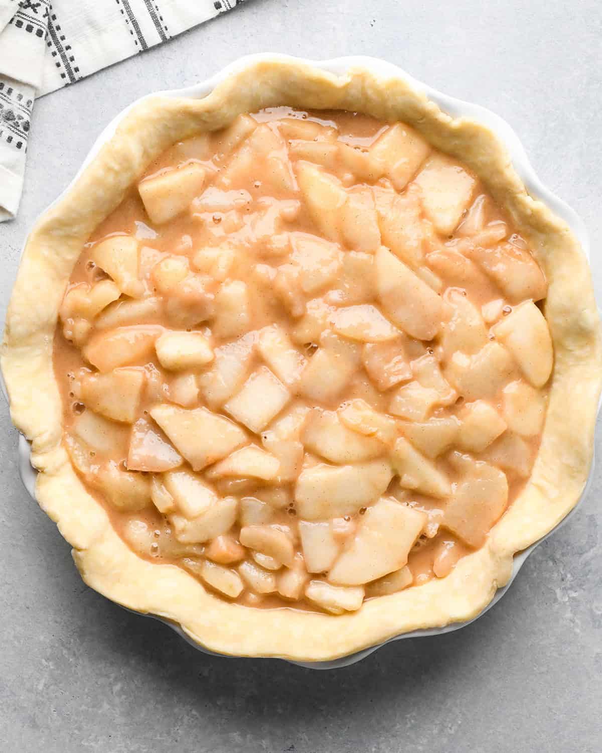 How to Make a Lattice Pie Crust - pie filled with filling