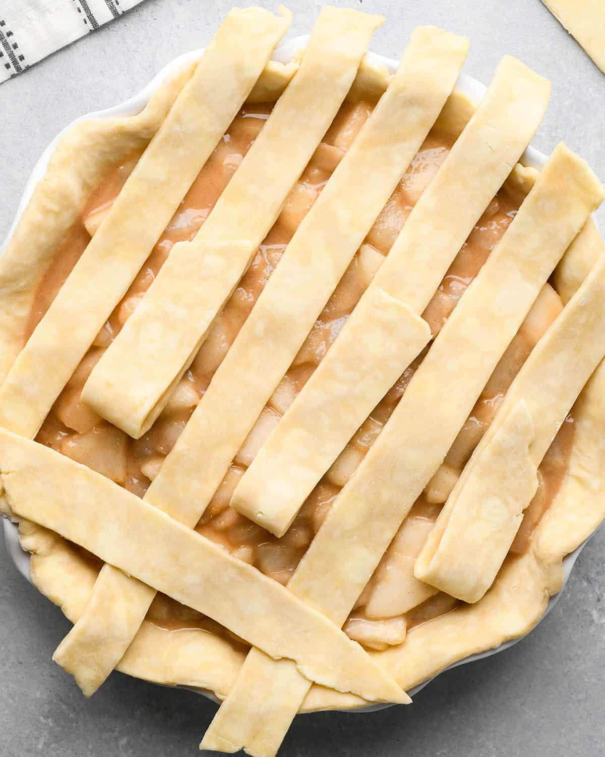 How to Make a Lattice Pie Crust - adding a vertical strip over 3 horizonal strips