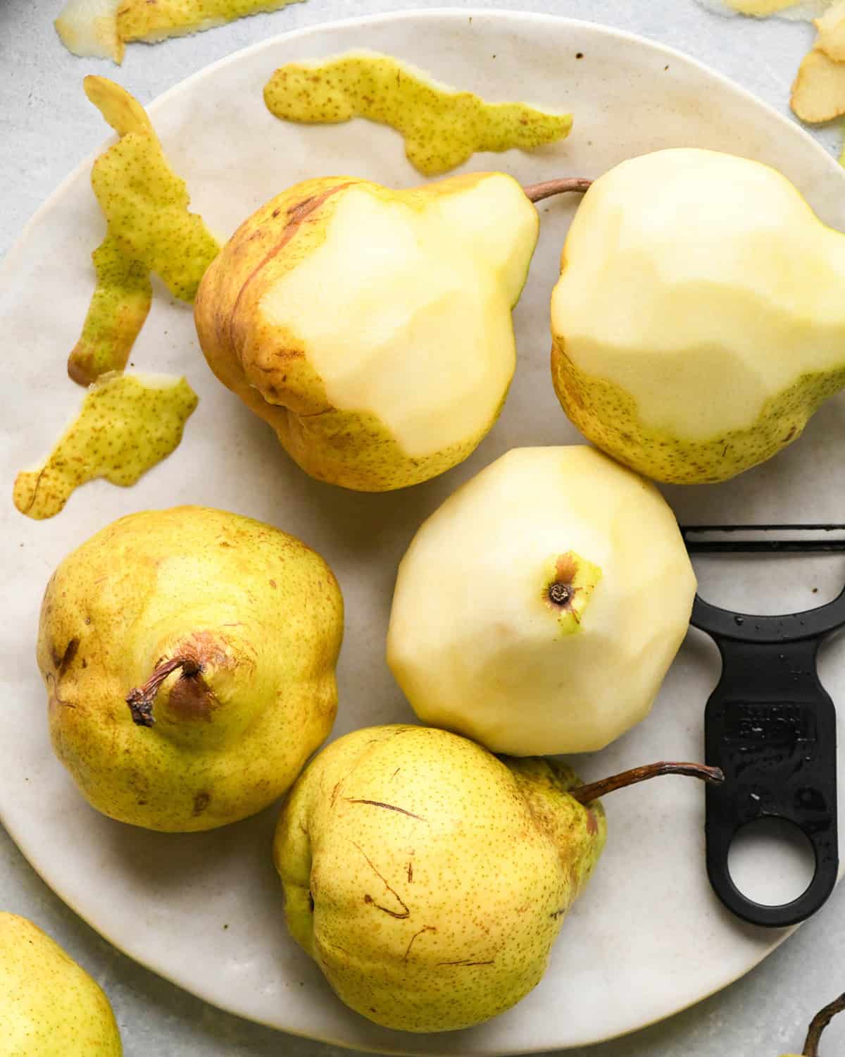 How to Make Pear Pie - peeling 5 pears