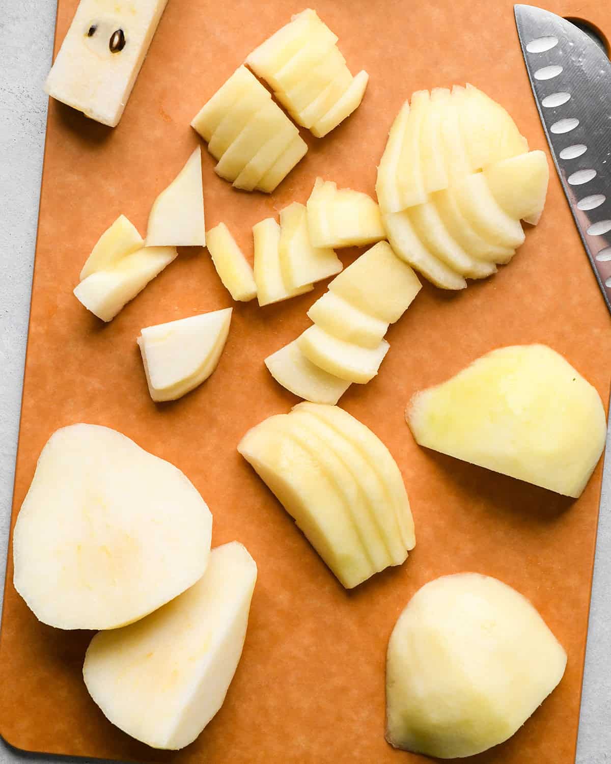 How to Make Pear Pie - slicing pears on a cutting board